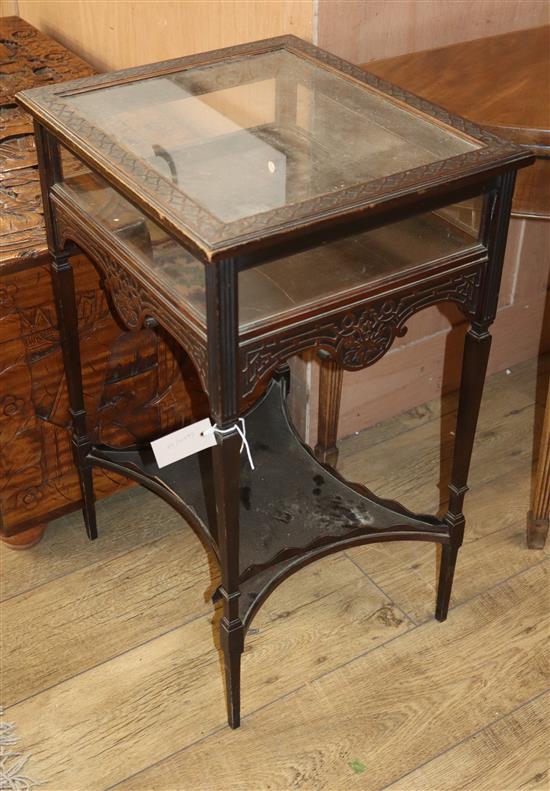 An Edwardian blind fret carved display table W.50cm